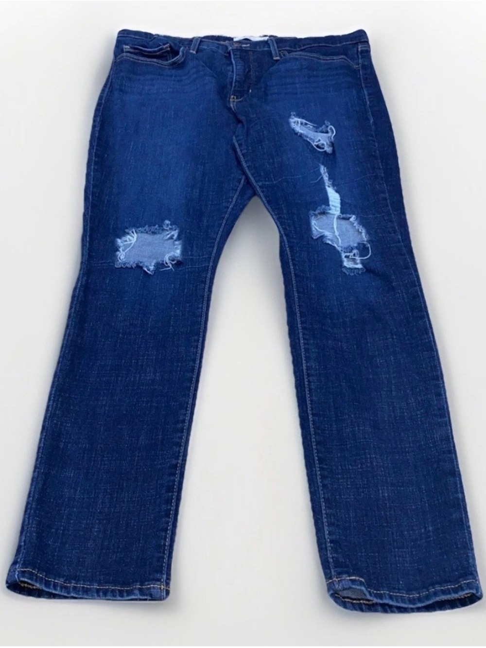 Levi's Women's Skinny Jeans in Dark Blue with Distressed Knees